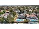 Aerial view of a house with a private pool and solar panels in a neighborhood at 2425 Greens Ave, Henderson, NV 89014