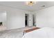 Spacious bedroom with ensuite bathroom and walk-in closet, illuminated by modern lighting at 2425 Greens Ave, Henderson, NV 89014