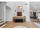 Bright and inviting foyer with stylish décor, wood accents, and an open floor plan at 2425 Greens Ave, Henderson, NV 89014