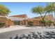 Exterior view of community center, showing covered entrance and landscaping at 2509 Libretto Ave, Henderson, NV 89052