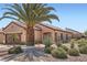 Charming single-story home with desert landscaping, including a beautiful palm tree at 2509 Libretto Ave, Henderson, NV 89052