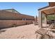 Large outdoor patio with dining area and fountain feature provides an inviting space at 2509 Libretto Ave, Henderson, NV 89052
