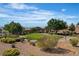 Well-maintained community park with lush green space, walking paths, and covered picnic area for residents to enjoy at 2554 Braehead Ln, Henderson, NV 89044