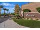 Community entrance sign with lush landscaping and well manicured lawn at 2554 Braehead Ln, Henderson, NV 89044