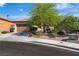 Charming single-story home with a well-manicured front yard and attached two car garage at 2554 Braehead Ln, Henderson, NV 89044