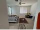 Bedroom featuring carpet flooring, ceiling fan, and natural lighting at 2571 Swans Chance Ave, Henderson, NV 89052