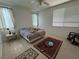 Bedroom with carpet flooring, ceiling fan, and natural lighting at 2571 Swans Chance Ave, Henderson, NV 89052