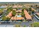 Aerial view of the community featuring multiple buildings, swimming pool, and well-manicured landscaping at 2606 S Durango Dr # 260, Las Vegas, NV 89117