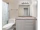 Bathroom features a single vanity, a mirror and updated hardware at 2606 S Durango Dr # 260, Las Vegas, NV 89117