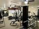 Well-equipped gym featuring modern machines and mirrored walls for a comprehensive workout experience at 2606 S Durango Dr # 260, Las Vegas, NV 89117