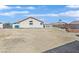 Large backyard featuring a sizable area for landscaping or other personalizations at 2805 El Cubano Ct, North Las Vegas, NV 89030