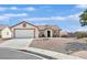 Charming single-story home featuring a well-maintained yard with desert landscaping at 2805 El Cubano Ct, North Las Vegas, NV 89030