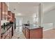 Well-equipped kitchen with island sink, stainless appliances, and modern cabinetry at 2805 El Cubano Ct, North Las Vegas, NV 89030