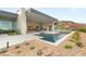 Expansive backyard featuring a modern pool, patio, and drought-resistant landscaping at 3 Horseshoe Rock Ct, Henderson, NV 89012