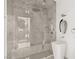 Modern bathroom featuring a luxurious walk-in shower with marble tile and stylish fixtures at 3 Horseshoe Rock Ct, Henderson, NV 89012