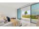 Bright bedroom with sliding glass doors opening to a patio with mountain views at 3 Horseshoe Rock Ct, Henderson, NV 89012