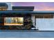 Striking exterior view showcasing the modern fireplace with marble and granite accents at 3 Horseshoe Rock Ct, Henderson, NV 89012