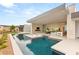 Beautiful home exterior features a luxurious pool and an open layout perfect for indoor/outdoor entertaining at 3 Horseshoe Rock Ct, Henderson, NV 89012