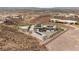 Contemporary home nestled in a desert hillside, featuring solar panels and stunning views of the valley at 3 Horseshoe Rock Ct, Henderson, NV 89012