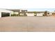 Expansive motor court showcasing the contemporary architecture of the home at 3 Horseshoe Rock Ct, Henderson, NV 89012