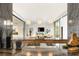 Modern kitchen with granite counters, stainless appliances, and open floor plan at 3 Horseshoe Rock Ct, Henderson, NV 89012