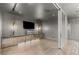 Elegant living room boasts hardwood floors, decorative lighting, and a mirrored entertainment center at 3 Horseshoe Rock Ct, Henderson, NV 89012
