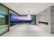Spacious living room with city views, fireplace, marble wall, and open floor plan at 3 Horseshoe Rock Ct, Henderson, NV 89012