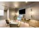 Modern lounge features a large screen TV, unique lighting, and stylish seating at 3 Horseshoe Rock Ct, Henderson, NV 89012