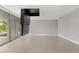 Empty main bedroom with floor to ceiling windows and an accent wall at 3 Horseshoe Rock Ct, Henderson, NV 89012