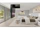 Bright main bedroom showcasing a pop-up television and ample natural light at 3 Horseshoe Rock Ct, Henderson, NV 89012