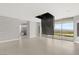 Empty modern main bedroom with floor to ceiling windows overlooking the exterior at 3 Horseshoe Rock Ct, Henderson, NV 89012