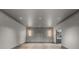An interior view of a room with hardwood floors, patterned walls, and recessed lighting, showcasing its modern design at 3 Horseshoe Rock Ct, Henderson, NV 89012