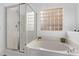 Spa-like bathroom with a separate shower and large soaking tub at 3005 Dotted Wren Ave, North Las Vegas, NV 89084