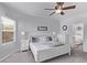Comfortable bedroom with large windows and a view to the Primary bathroom at 3005 Dotted Wren Ave, North Las Vegas, NV 89084