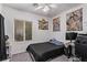 Comfortable bedroom with a large window, ceiling fan and neutral paint at 3005 Dotted Wren Ave, North Las Vegas, NV 89084
