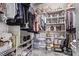 Spacious walk-in closet with shelves, clothing racks, and plenty of room for storage at 3005 Dotted Wren Ave, North Las Vegas, NV 89084