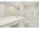 Well-lit bathroom with a shower-tub combo, a stylish vanity, and modern fixtures at 354 Spotted Dove St, Las Vegas, NV 89138