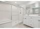 Bright bathroom features double vanity and glass enclosed shower at 354 Spotted Dove St, Las Vegas, NV 89138
