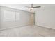 Bright bedroom featuring a ceiling fan and window at 354 Spotted Dove St, Las Vegas, NV 89138