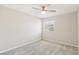 Light filled bedroom with plush carpeting, a ceiling fan, and a bright window at 354 Spotted Dove St, Las Vegas, NV 89138