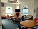 Community common room with comfortable seating, tables, and a large TV for residents at 3550 Bay Sands Dr # 3001, Laughlin, NV 89029