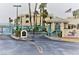 Inviting gated community entrance with lush landscaping and charming architectural details at 3550 Bay Sands Dr # 3001, Laughlin, NV 89029