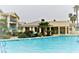 A resort-style pool surrounded by lush landscaping and comfortable lounge chairs for relaxation at 3550 Bay Sands Dr # 3001, Laughlin, NV 89029