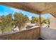 Balcony view featuring green foliage and covered parking. Relax and enjoy at 3937 S Torrey Pines Dr, Las Vegas, NV 89103