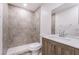Modern bathroom with walk-in shower featuring decorative tile, sleek fixtures, and contemporary vanity at 3937 S Torrey Pines Dr, Las Vegas, NV 89103