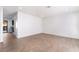 An airy living room featuring light wood-look flooring, recessed lighting, and neutral walls, offering a modern feel at 3937 S Torrey Pines Dr, Las Vegas, NV 89103