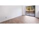 Bright living area with light tile floors, access to an outdoor patio, and neutral walls, offering a cozy ambiance at 3937 S Torrey Pines Dr, Las Vegas, NV 89103
