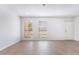 Spacious living area featuring bright walls, modern flooring, and ample sunlight through large windows, creating a cozy setting at 3937 S Torrey Pines Dr, Las Vegas, NV 89103