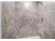 Updated walk-in shower features modern tile, sleek fixtures, and a clean, contemporary design at 3937 S Torrey Pines Dr, Las Vegas, NV 89103