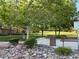 A peaceful community park with walking paths, benches, and lush landscaping at 4012 Owlshead Mountain St, Las Vegas, NV 89129
